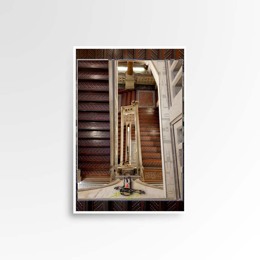 Photography print image of lifelike figure, on the ledge between two flights of mosaic pattern stairs in a library. Colours brown, red, brown.  Purpose, to be enjoyed, questioned and discussed.
JPG
• 833 × 833
• 73.96 kB